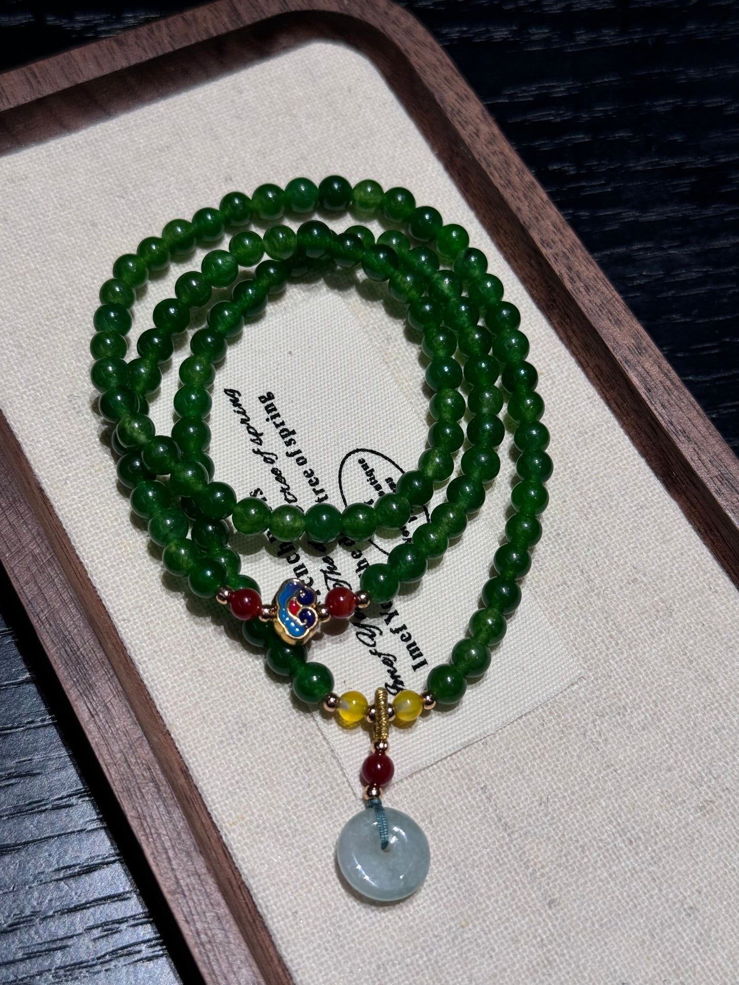 Jade auspicious beads bracelet with auspicious clouds and lucky circle pendant